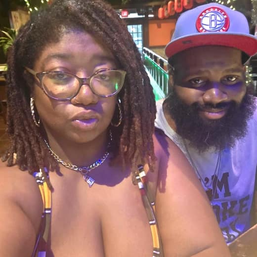 Chamere and Anthony together at the sushi bar on their planned Fells Point date night