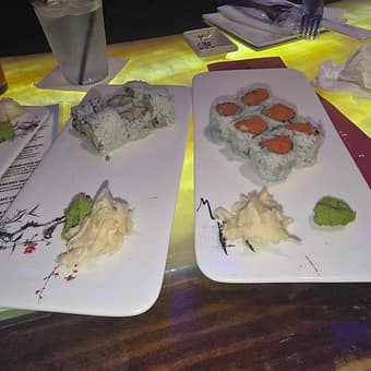 A second plate of sushi rolls with pickled ginger and wasabi from their Fells Point date